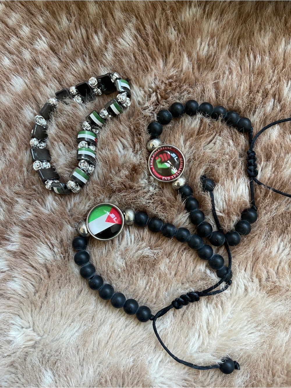 Matte Black Beaded Bracelet with Green, Red & White Accent Disc